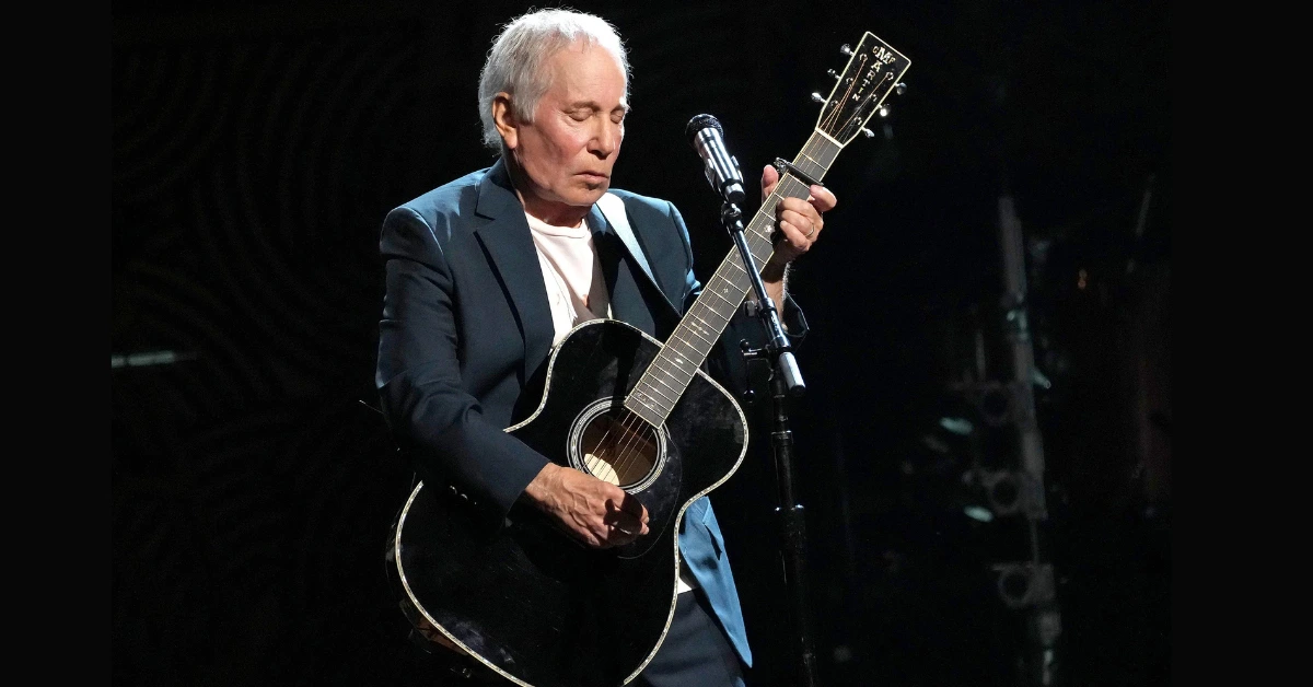 Paul Simon Performing Live on Stage with Guitar