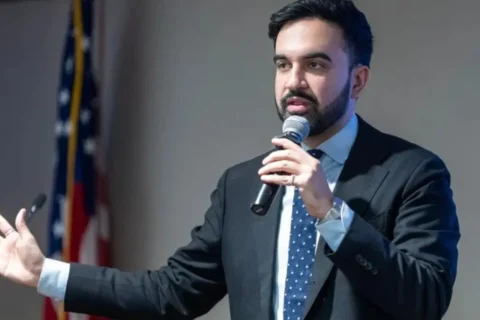Zohran Mamdani speaking at a community housing event in new york.
