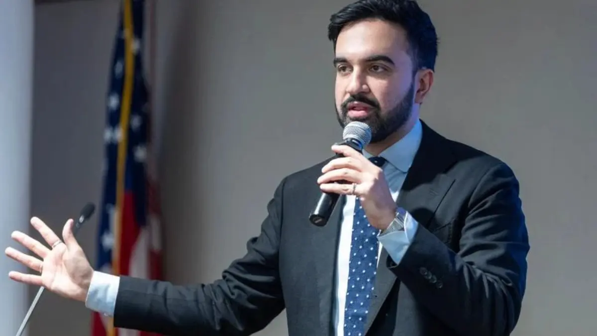 Zohran Mamdani speaking at a community housing event in new york.